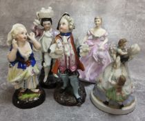 Three 19th century Pearlware figures of a Dandy, a Surprised Lady and a Fruit Carrier; another