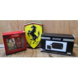 Ferrari interest - a Ferrari Cavallino Rampante Cast Plaque 30 x 20cms; Ferrari Red & Black