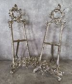 A pair of Rococo Revival silver plated table top easels, 40cm high