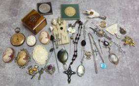 Costume jewellery including an unusual mourning pendant made to look like a pocket watch; a white