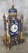 A French style cloisonne mantel clock, architectural case with five finials, white dial, Roman