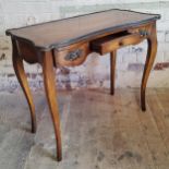 A good reproduction Louis XV walnut French dressing table, bronze mounted dish top with elaborate