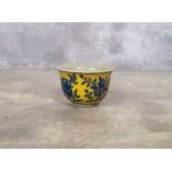 Oriental Ceramics - a Chinese tea bowl the yellow ground crackle glaze tea bowl decorated with