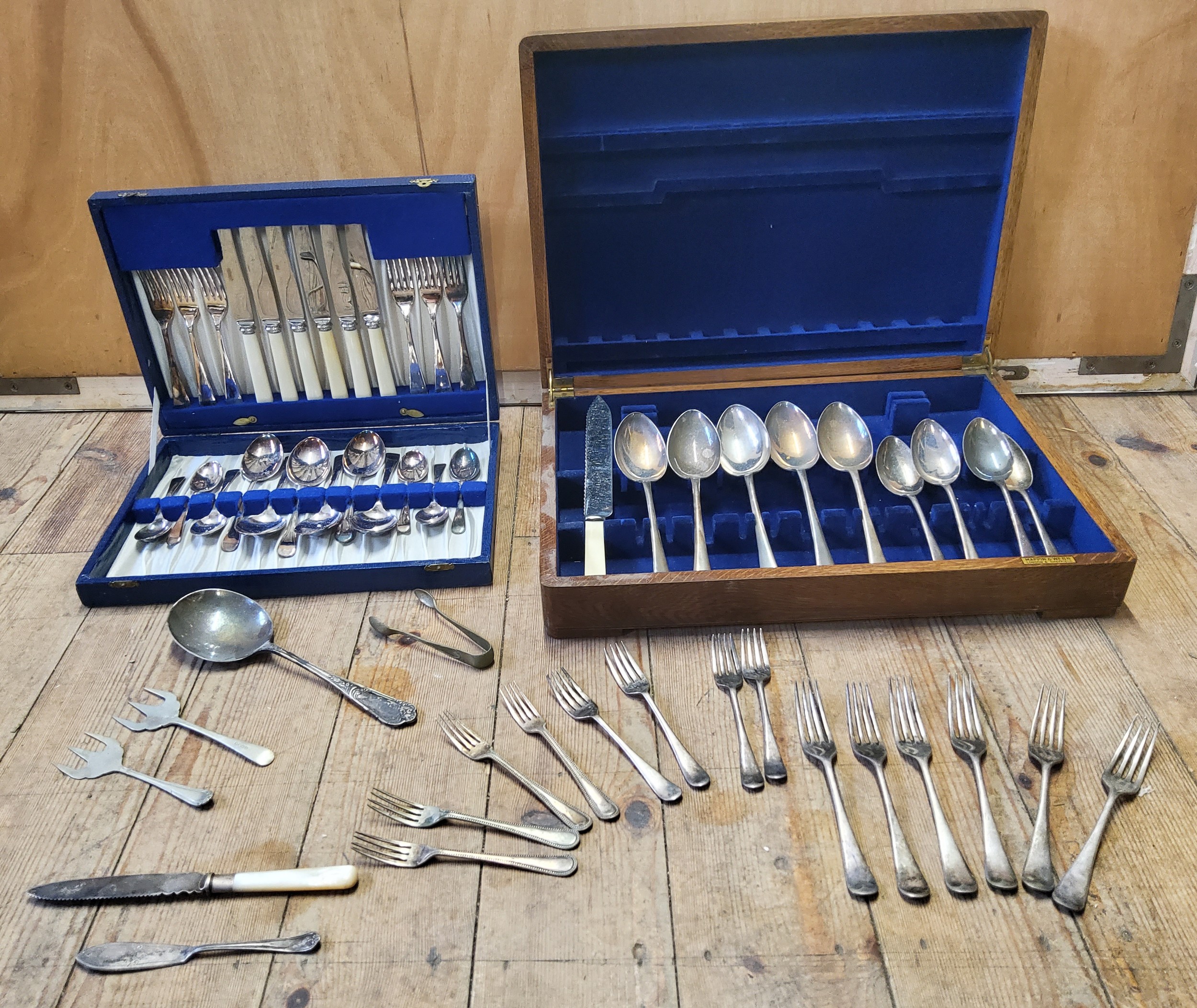 A Mappin and Webb canteen of Old English pattern cutlery for six, blue faux crocodile canteen;
