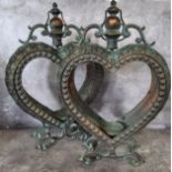 A pair of copper heart shaped glazed lanterns