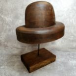 A 19th century French milliners fruit wood bowler hat block on stand