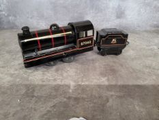 A Brimtoy O gauge clockwork 040 locomotive no 67040, black with red & cream lines, appears unused