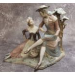 A large Lladro figural group of a gallant and his beau in an naturalistic setting (faults) approx