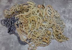 A quantity of pearl and faux pearl necklaces, bracelets & earrings
