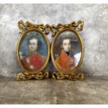 A near pair of oilographs depicting a Regency British Red Coat and Napoleonic officer in matching