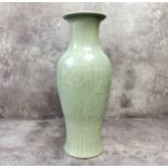 Oriental Ceramics - A 20th century Chinese celadon vase, the slender baluster shaped vase