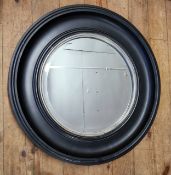 A convex mirror with bold black frame, 68cm diameter