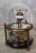 A brass novelty automaton table clock, as fish in a bowl, central posted globular dial with Arabic