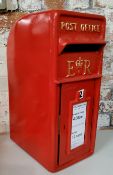 A reproduction Elizabeth II cast iron post box, in red livery with gilt detail, with two brass keys,