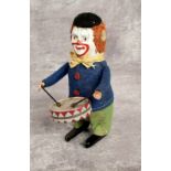 Schuco 986/1 Solisto clockwork Clown Drummer - with blue felt jacket and green trousers, tinplate