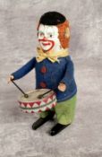 Schuco 986/1 Solisto clockwork Clown Drummer - with blue felt jacket and green trousers, tinplate