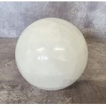 A large rock quartz crystal fortune tellers / witch's ball approx. 12.5cms dia.