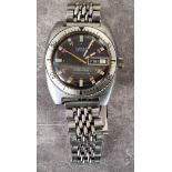 A 1960's Lator 'Selfwinding' gentleman's day/date wristwatch, Swiss 25 jewel movement, black dial,