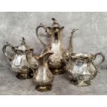 An impressive Victorian Martin Hall & Co. Sheffield silverplate four piece chased with a family