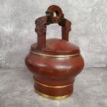 An early 20th century Japanese offering rice carrier / wedding basket, red lacquered with gilt metal