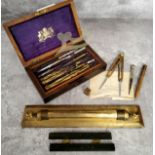 Scientific Instruments - A Victorian mahogany cased geometry set, "Compass Superieurs, Brev"; bronze