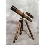 A bronzed brass novelty double barrel nautical desk telescope on tripod stand 31cms high