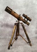 A bronzed brass novelty double barrel nautical desk telescope on tripod stand 31cms high