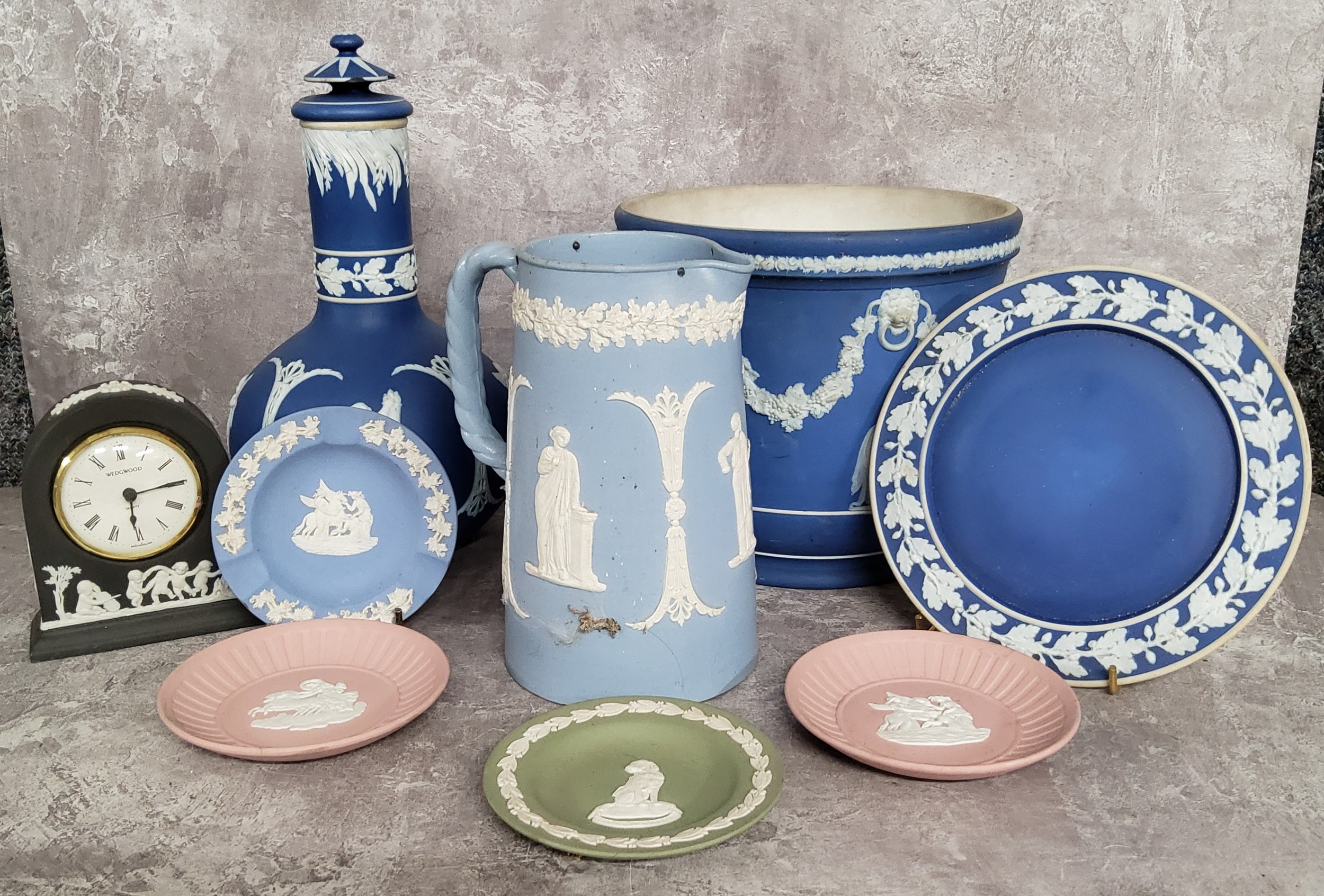 Decorative Ceramics- Wedgwood Jasperware including a basalt mantel clock; globe and stem ewer; water