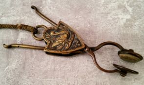 A Victorian Eyre's Patent brass skirt lifter of scissor form, the heraldic shield shaped sliding