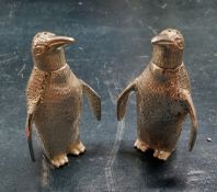 Novelty cast white metal cruets in the form of penguins