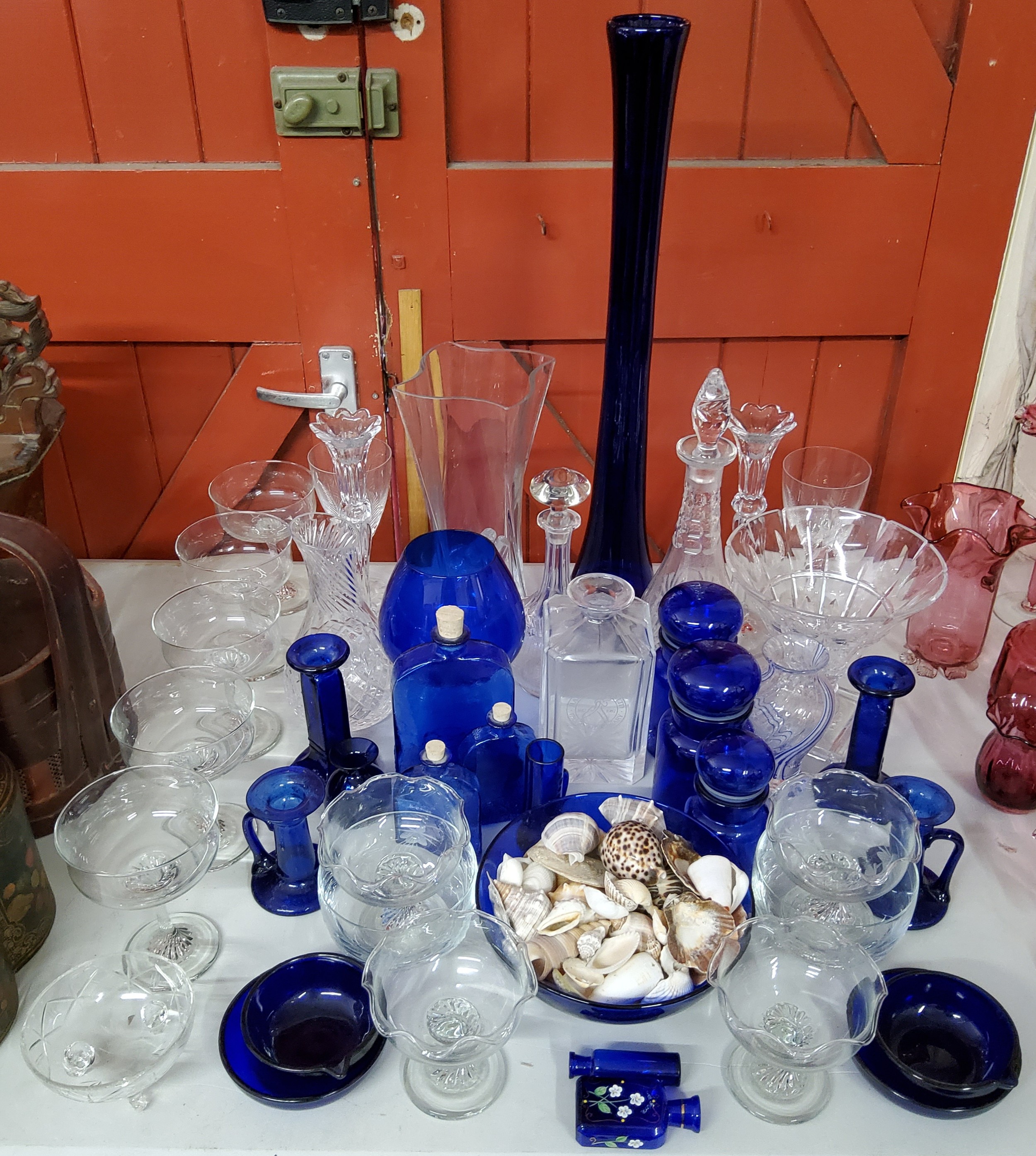 Glassware - Bristol blue examples including chamberstick, candlesticks, bottles, a very large