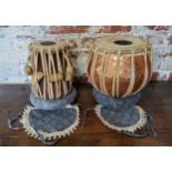 A Tabla set of two Indian drums, consisting of larger Daya and smaller Baya drum, housed in