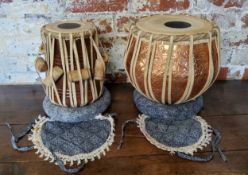 A Tabla set of two Indian drums, consisting of larger Daya and smaller Baya drum, housed in