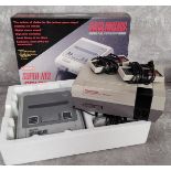 Retro gaming - a Nintendo Entertainment System NES Version, two controllers, polystyrene packaging