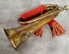 Militaria - A WWI copper and brass bugle with Ontario Regiment badge of a cat with arched back