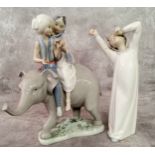 Lladro gloss finish porcelain figurine of Indian children seated on an elephant; another Bedtime