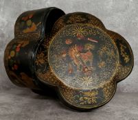 A Himalayan wedding basket decorated with offerings surrounding a central dragon, each panel painted