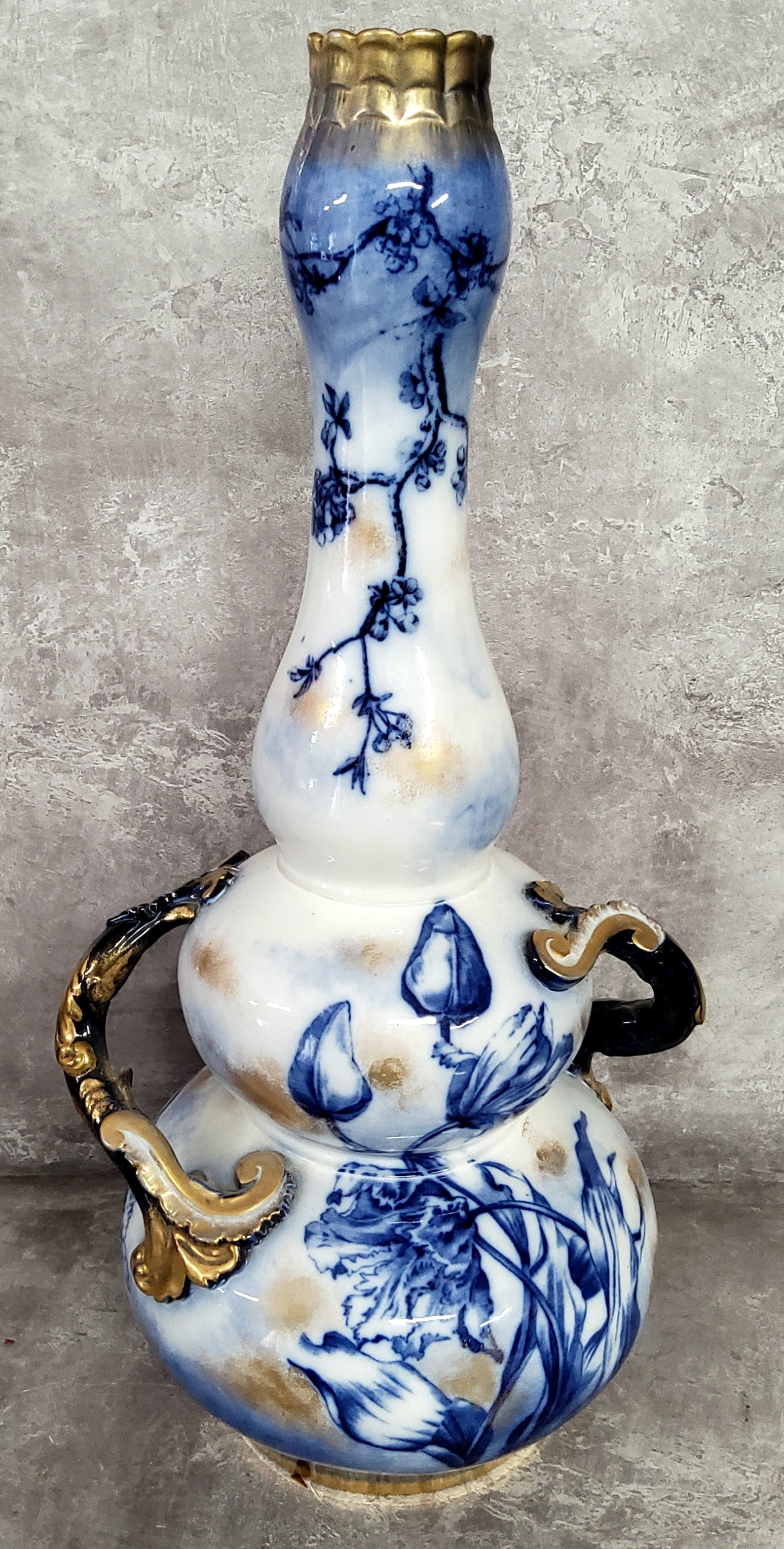 A scarce substantial Victorian George Jones double gourd twin handled vase, with flow blue and