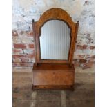 A George II feather banded burr walnut dressing table mirror, fall front housing six drawers  Height