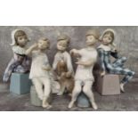 Lladro figures including 'Be Quiet' no. 4522; Girl trying on Lipstick no.1083; Girl Manicuring 1082;