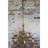 A Dutch style brass 12 branch chandelier Height 70cm x dia 75cm, (total height with chain 133cm)