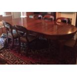 A large George III reproduction mahogany D-end dining table with two additional leaves leaves,