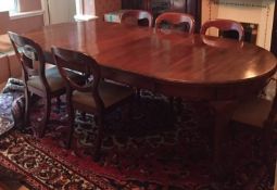 A large George III reproduction mahogany D-end dining table with two additional leaves leaves,
