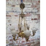 A 19th century French six branch brass chandelier upright ribbed, fluted glass shades Height 70cm