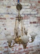 A 19th century French six branch brass chandelier upright ribbed, fluted glass shades Height 70cm