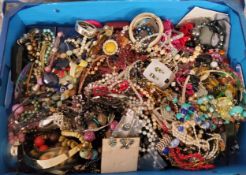 Costume jewellery - a large quantity of coloured beads, bangles, brooches, jewellery boxes; etc