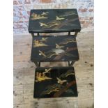 Japanese black lacquer nest of tables depicting stylised traditional Japanese scene Largest table