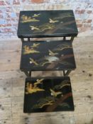 Japanese black lacquer nest of tables depicting stylised traditional Japanese scene Largest table