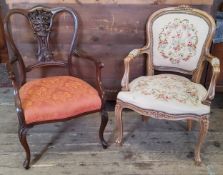 A French fratulie chair with Aubusson style tapestry upholstery; a late 19th century mahogany