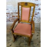 A Michael 'Seahorseman' Riley (Yorkshire School), English oak rocking chair. Follower of Mouseman